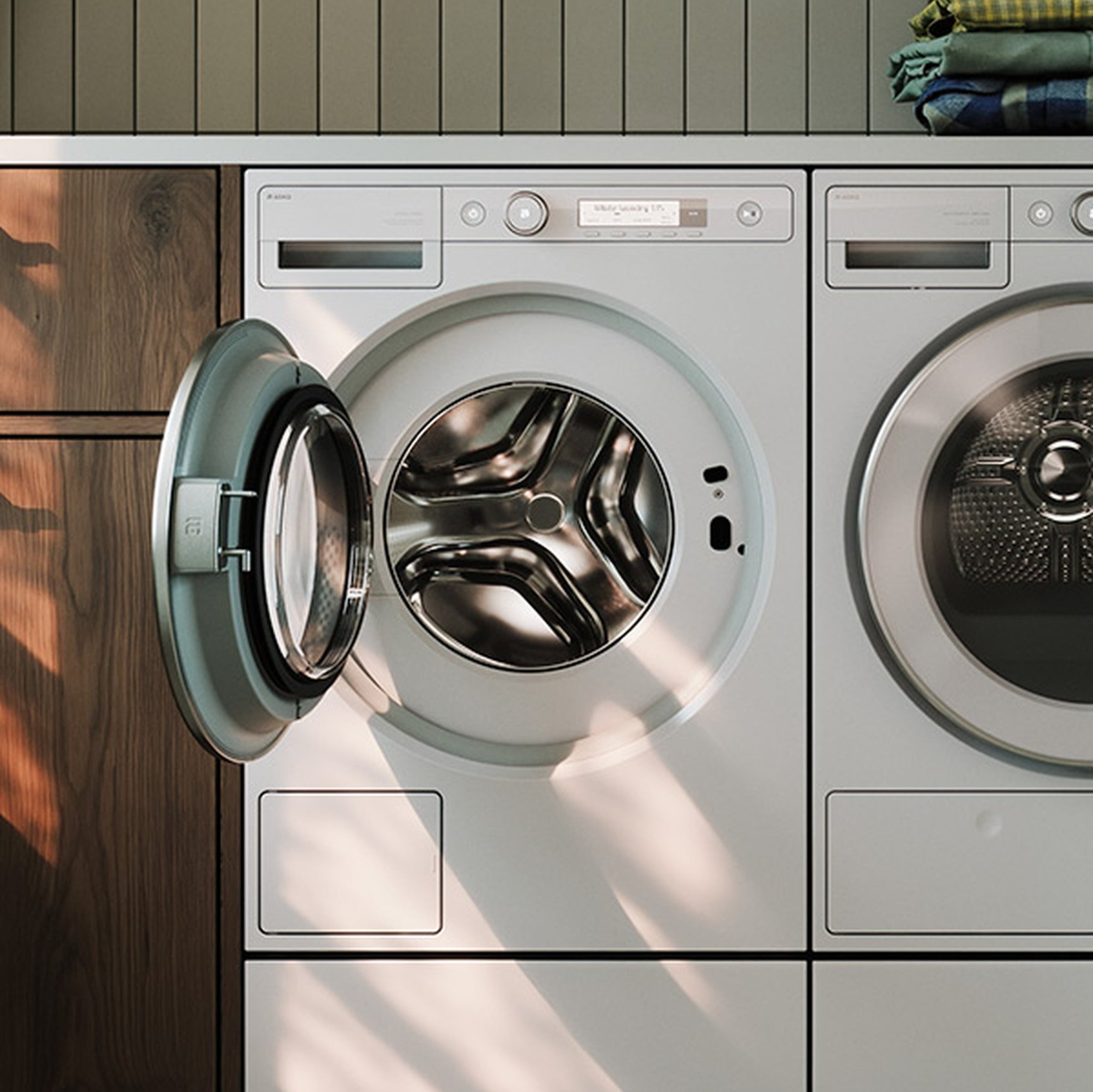 ASKO LOGIC Waschmaschine eingebaut neben ASKO Classic Wäschetrockner asko-shop.ch